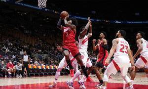 NBA公开赛-火箭双星低迷，猛龙主场火箭